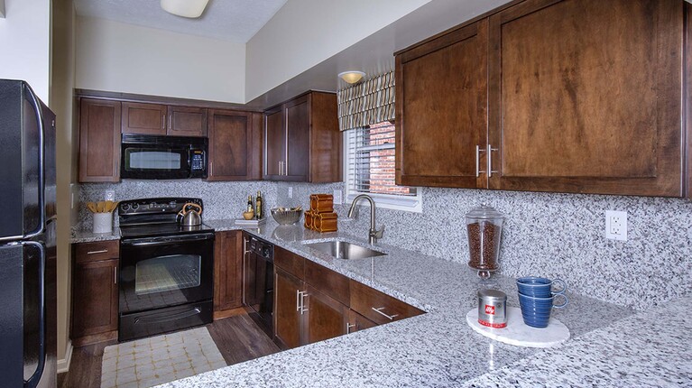 Modern Kitchen with Granite Countertops and Custom Cabinetry