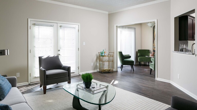 Open Concept Living Space with Wood-Inspired Plank Flooring