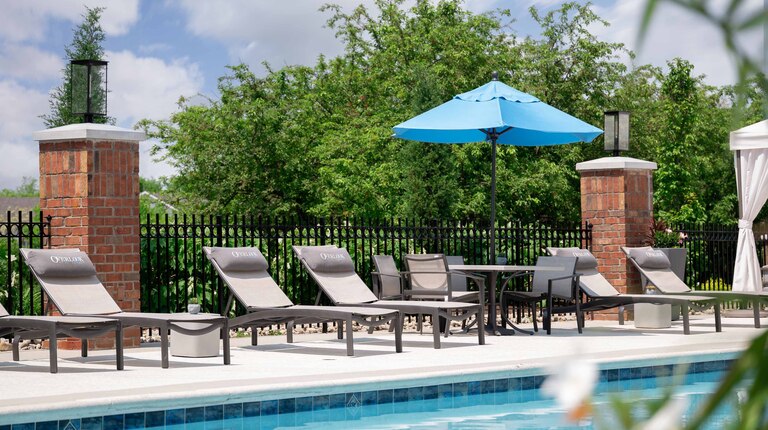 Resort-Inspired Pool with Sundeck and Lounge Seating